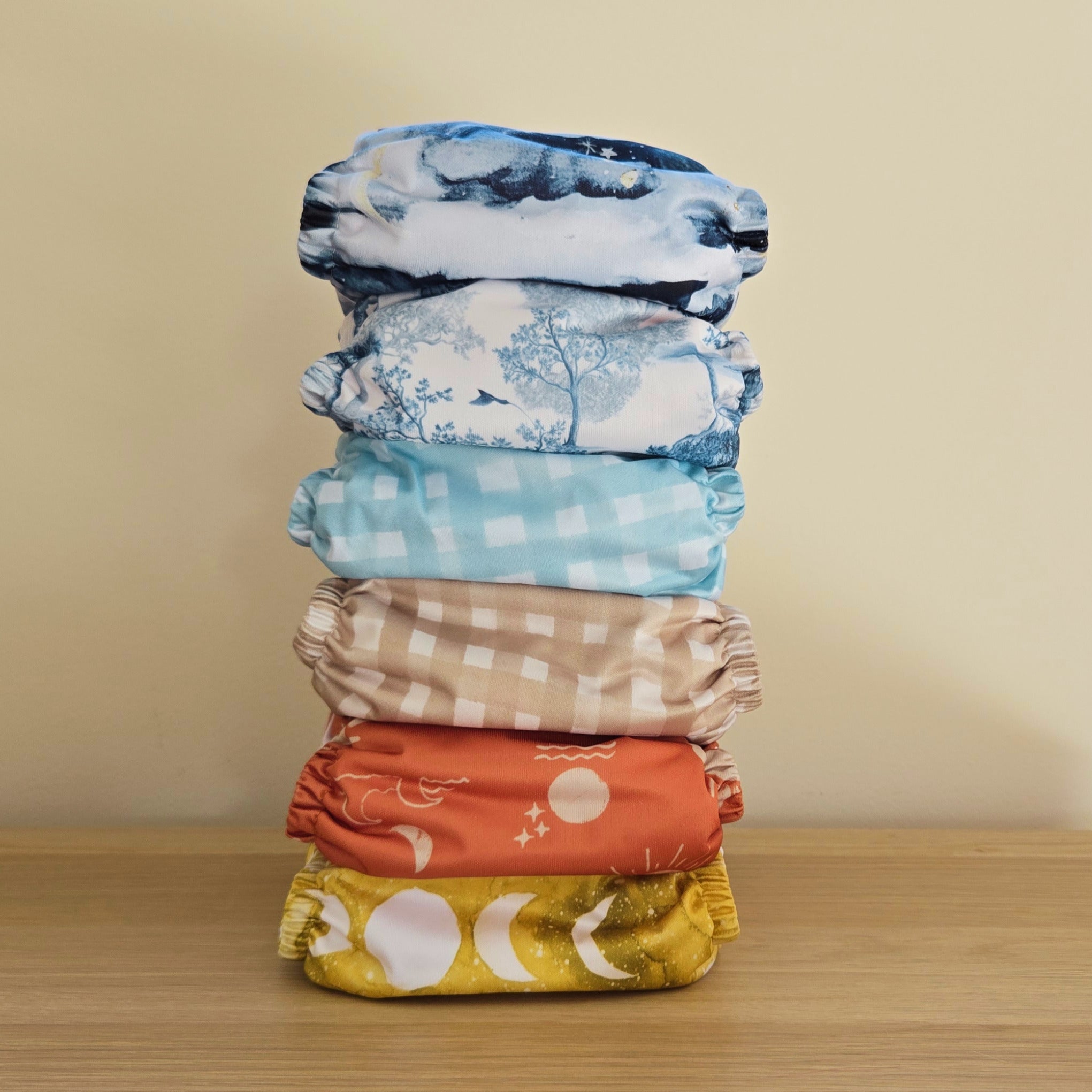 a stack of 6 cosy nappes